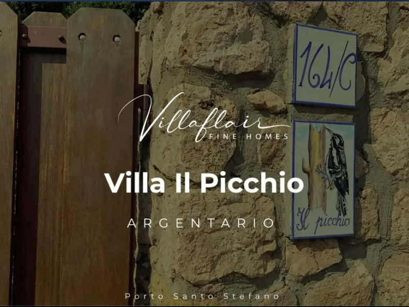Stone wall with wooden gate, signs for Villa Il Picchio, Porto Santo Stefano, Argentaroo.